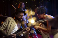 medium-shot-band-performing-concert